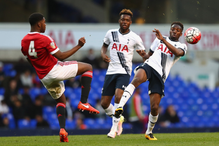 Ro-Shaun Williams (left) in action against Spurs