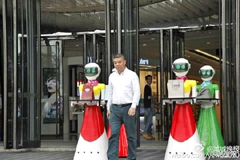 Chinese tycoon's robot maids