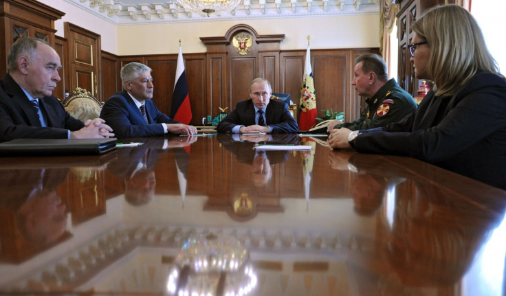 Putin  alongside the new head of the National Guard, Viktor Zolotov