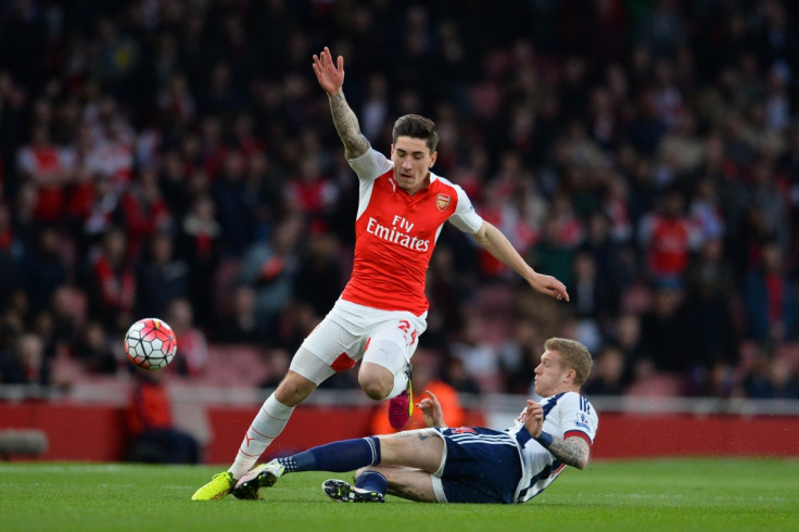 Hector Bellerin is tackled