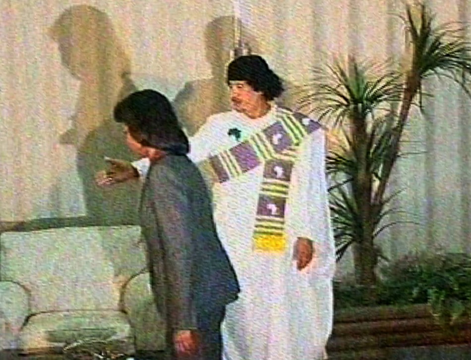 Video grab of Libyan leader Muammar Gaddafi welcoming U.S. Secretary of State Condoleezza Rice in a government compound in central Tripoli