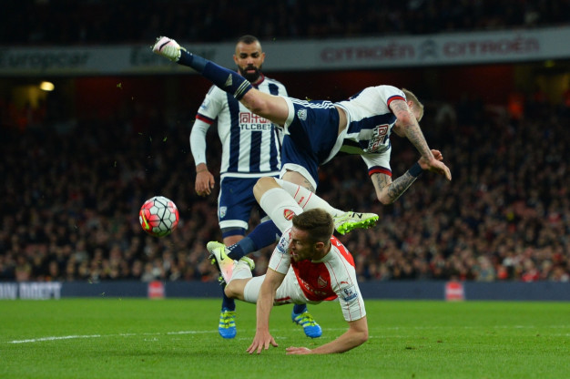 Players scrapping for a loose ball Players scrapping for a loose ball