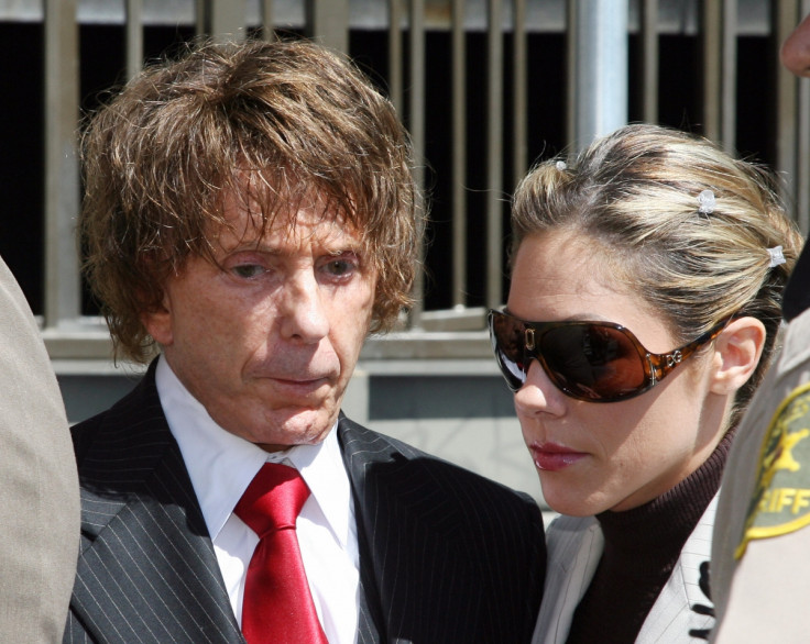 Music producer Phil Spector arrives with wifevRochelle