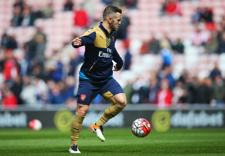 Jack Wilshere warms up before the game