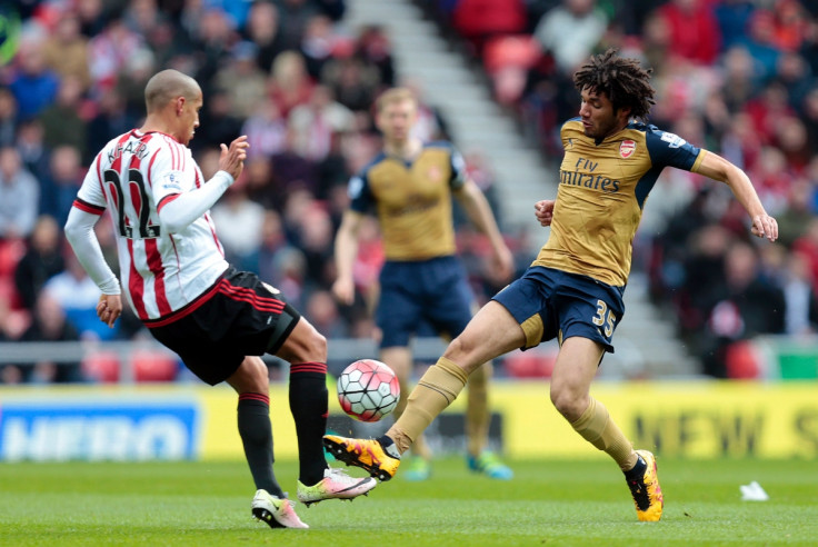 Mohamed Elneny (right) in action for Arsenal