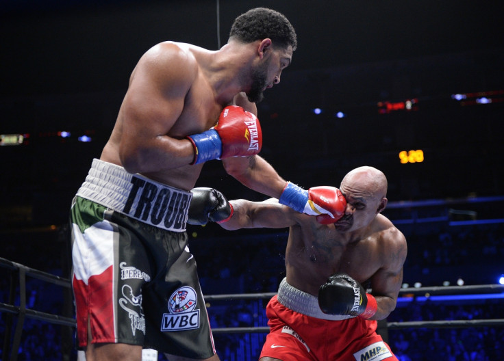 Dominic Breazeale (left) fighting against Amir Mansour