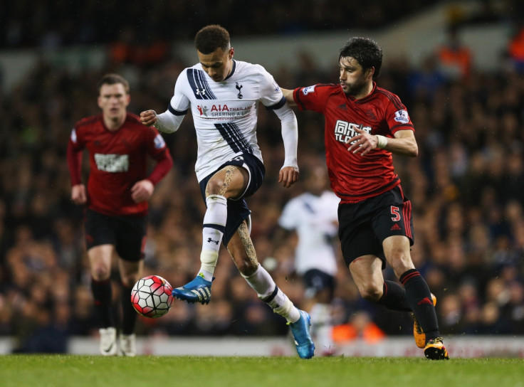 Dele Alli (left) battles with Claudio Yacob