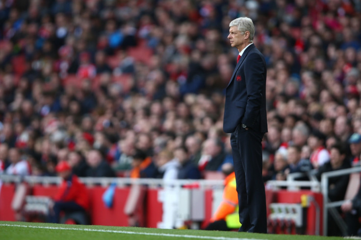 Arsene Wenger looks on