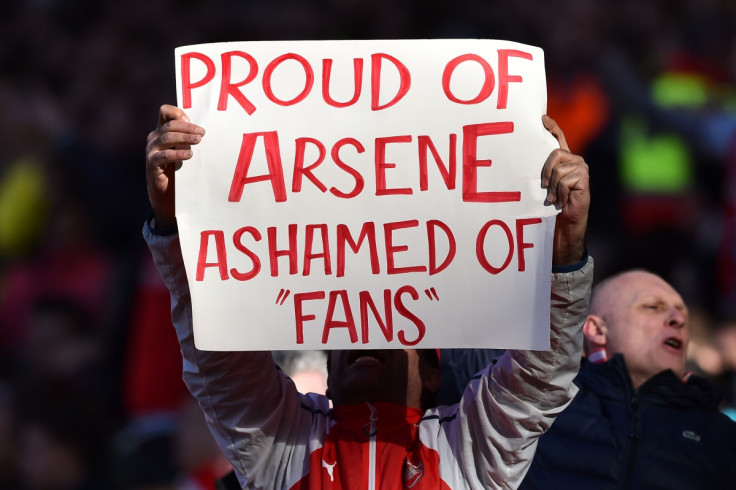 An Arsenal fan shows support for Wenger