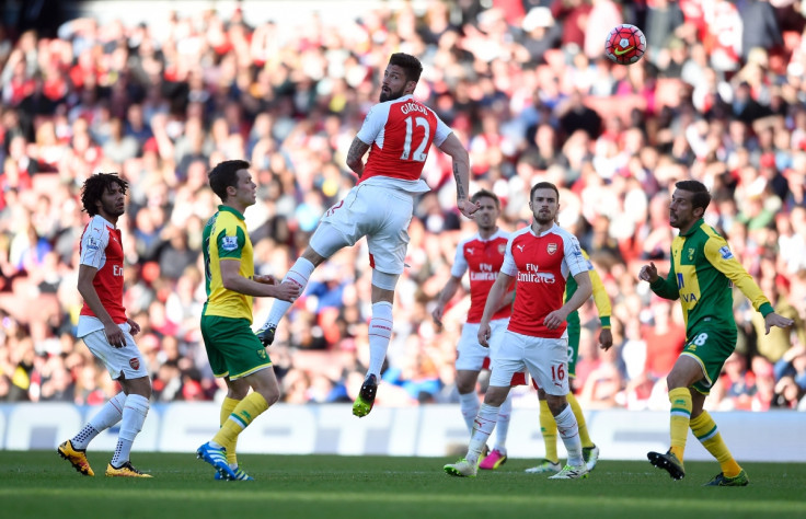 Giroud goes up for the ball