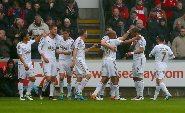 Swansea players celebrating a goal