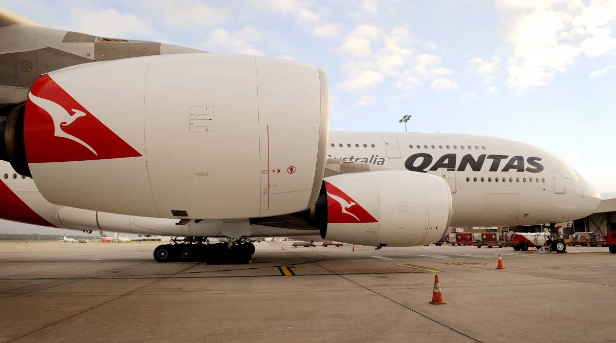 Australia's national carrier Qantas reports record profits and declares ...