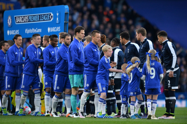 The teams shake hands