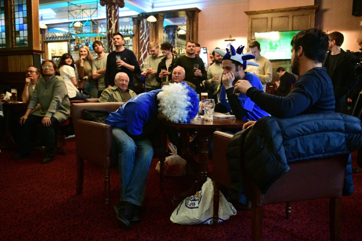 Leicester City fans watch anxiously