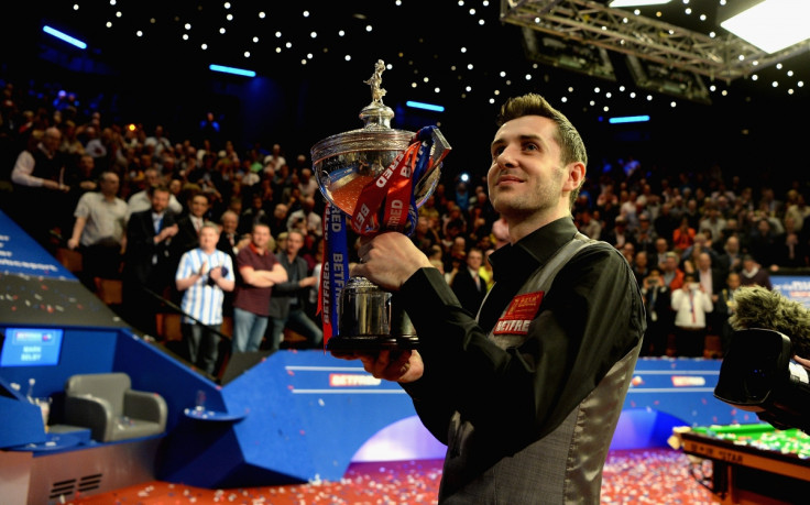Mark Selby holds the trophy aloft