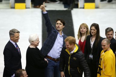 Justin Trudeau thumbs up with Prince Harry