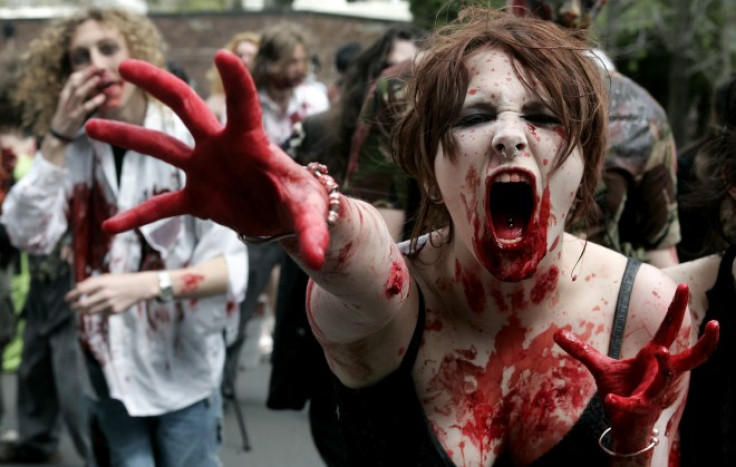 University students made up to look like zombies take part in a bid to break the world record for the &quot;biggest zombie lurch&quot; in Sydney