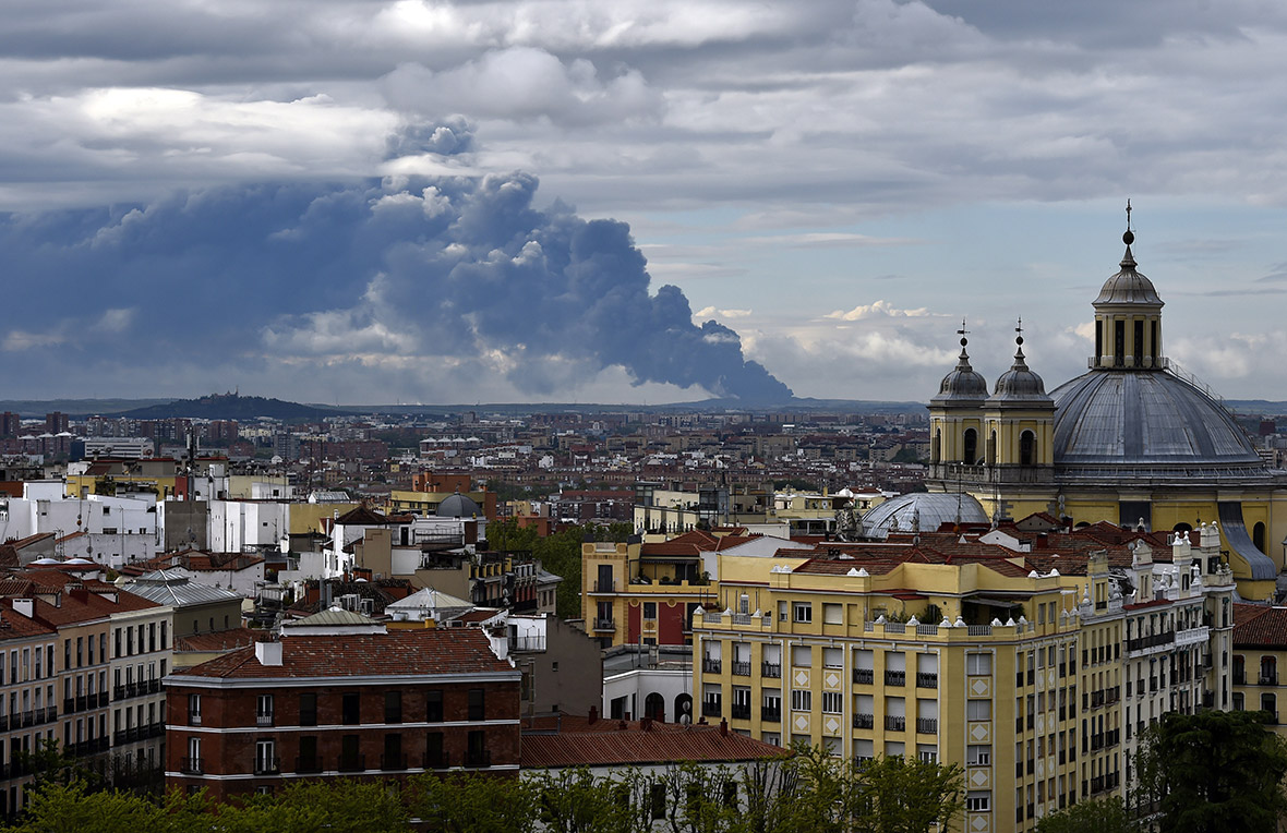 Spain: Thick clouds of toxic black smoke billow from inferno in huge