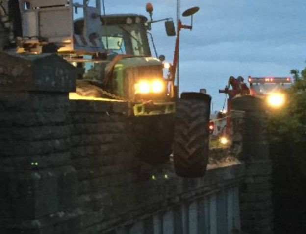 A stolen tractor crashed on a railway bridge