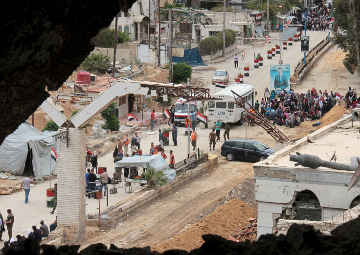 Students in Syria at government checkpoint