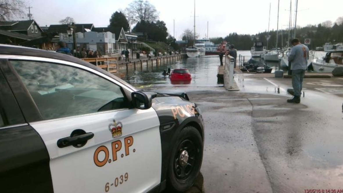 Woman drives car into Ontario lake Woman drives car into Ontario lake