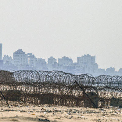 A picture taken from the beach in the southern Israeli kibbutz of Zikim shows the skyline of Gaza City