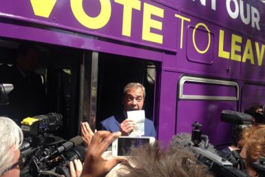 Nigel Farage shows his passport 