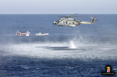 Migrants are rescued by the Italian Navy in the Mediterranean Sea Migrants are rescued by the Italian Navy in the Mediterranean Sea