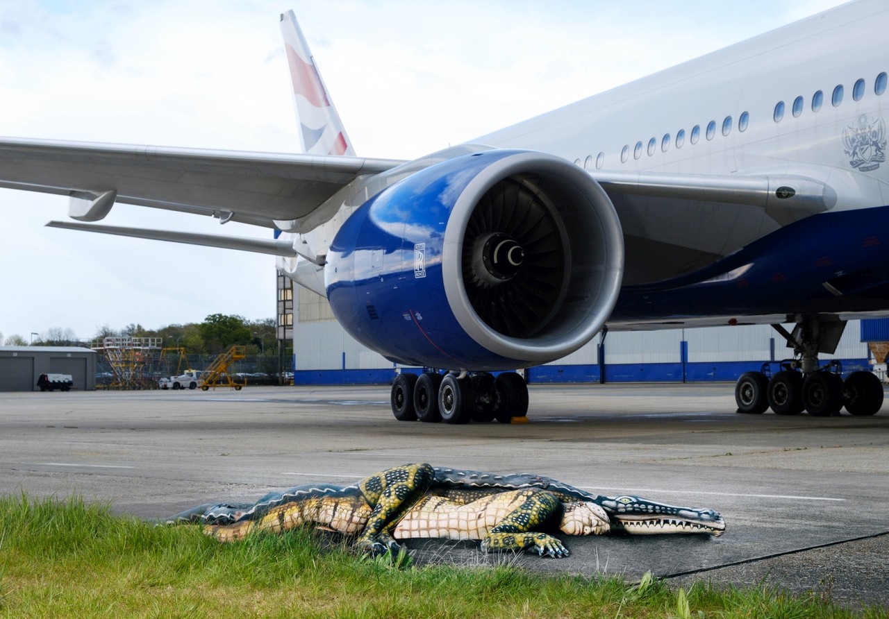 British Airways places human alligator on Gatwick airport runway to