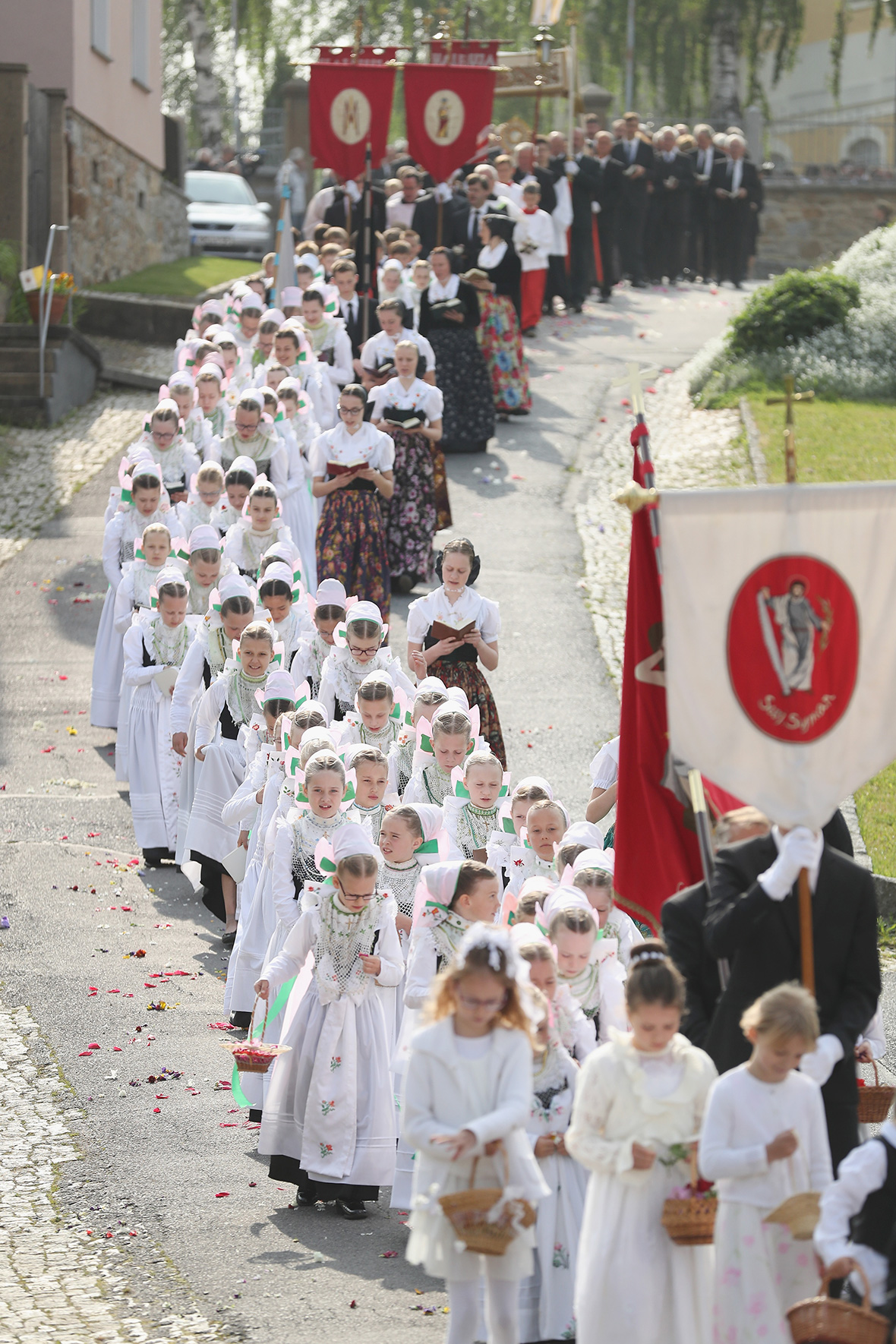 Corpus Christi Catholics take part in religious processions in