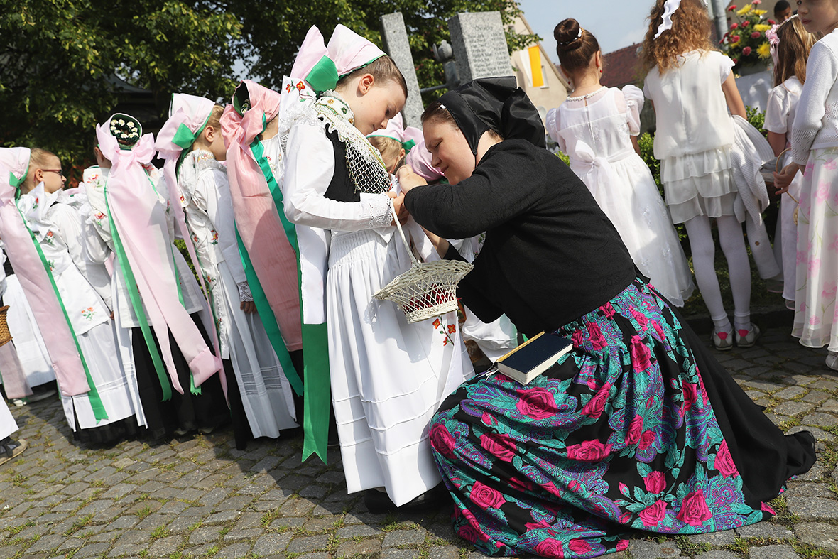 Corpus Christi Catholics take part in religious processions in