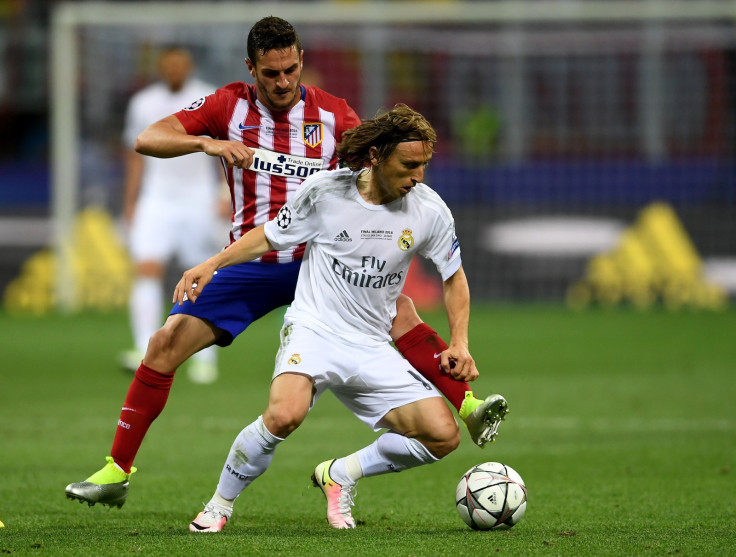 Luka Modric and Koke do battle