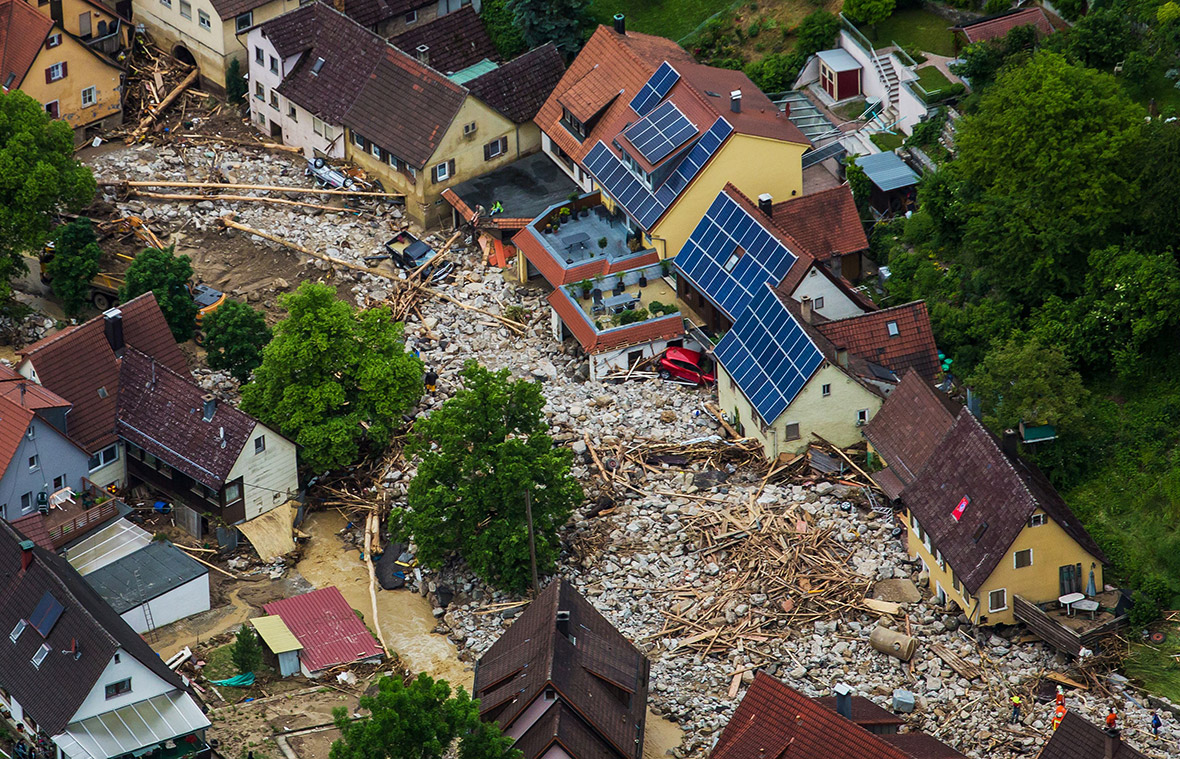 Germany: Deadly flash floods leave Braunsbach buried under rocks, trees ...