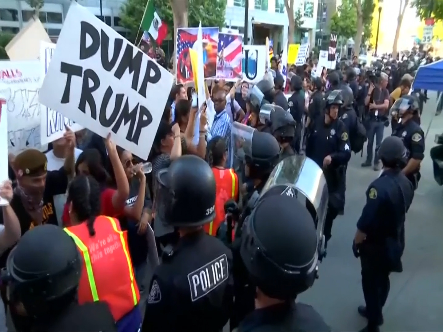 Anti-Trump demonstrators clash with supporters and police