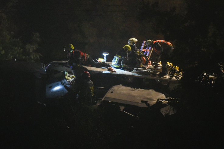 First-aid personnel work on the scene