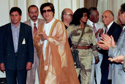 Moammar Gadhafi and Lady Gaga Moammar Gadhafi and Lady Gaga