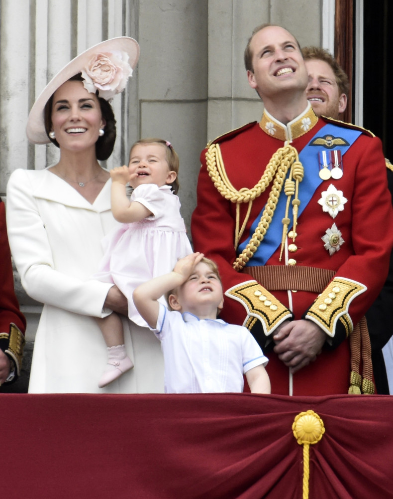 Catherine, Duchess of Cambridge holding Princess Charlotte
