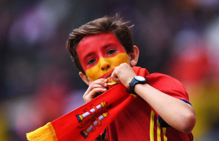 A young Spanish fan in the stands