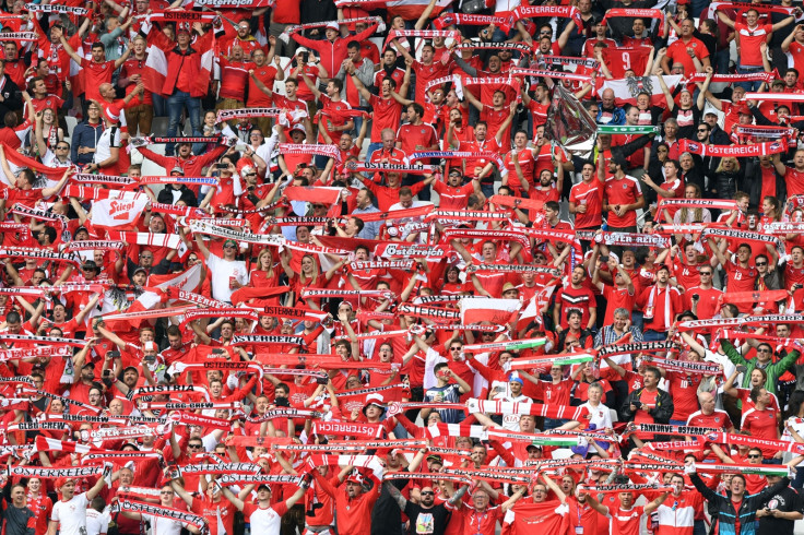 Austrian fans cheer their team on