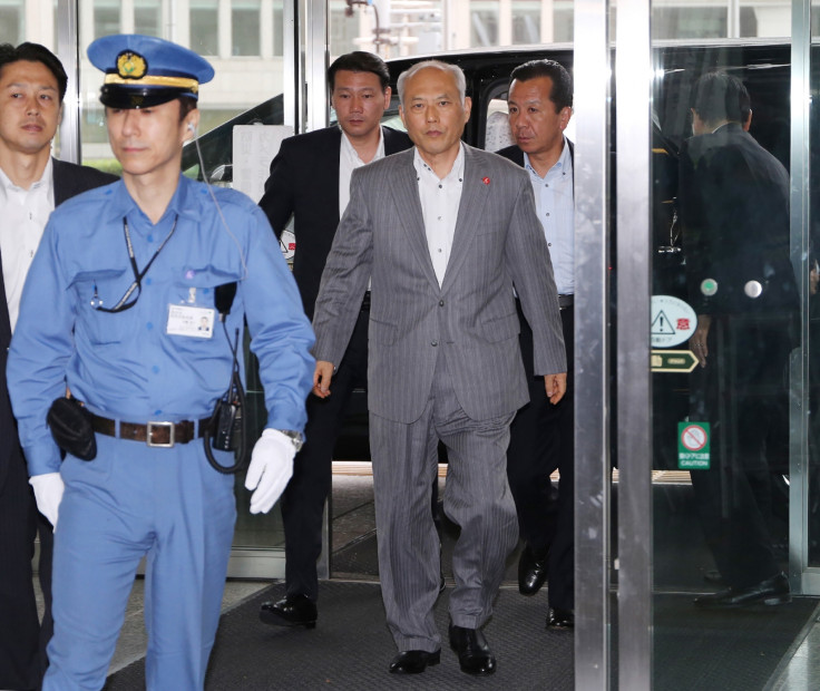 Japan governor arrives at government offices