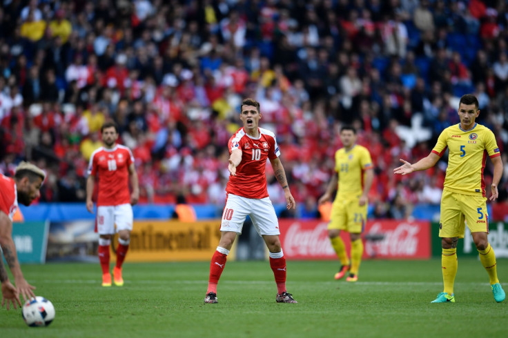 Xhaka calls for the ball