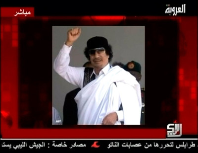 A still image of Libyan leader Moammar Gadhafi is displayed to accompany his audio message broadcast by Syrian TV channel Al-Orouba A still image of Libyan leader Moammar Gadhafi is displayed to accompany his audio message broadcast by Syrian TV channel Al-Orouba