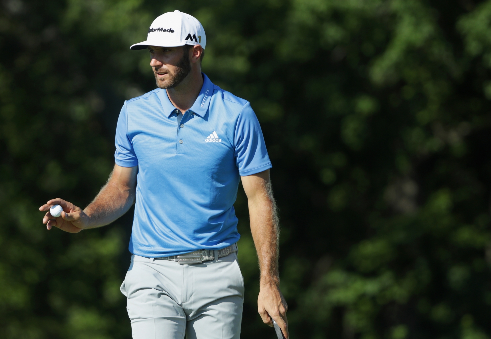 Dustin Johnson leads a delayed US Open after complete two rounds in one day...