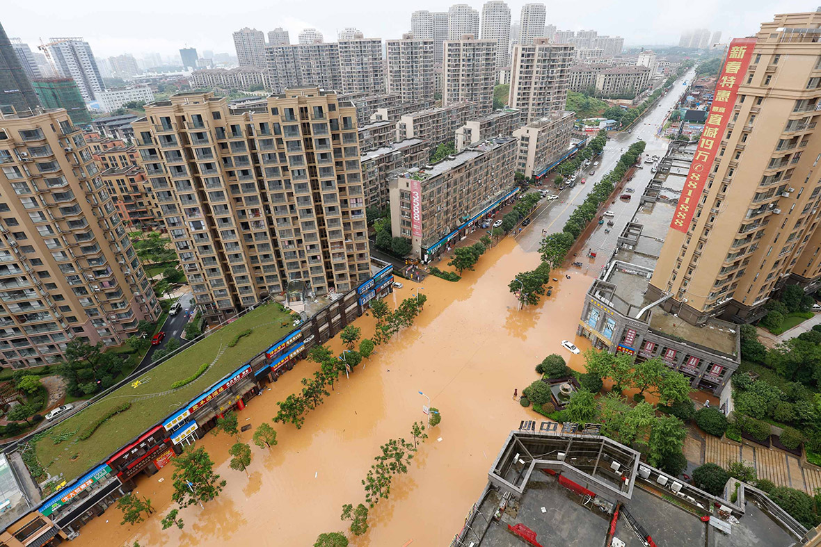 Photos of flash floods and landslides after week of torrential rain in