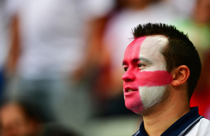 An England fan sings the anthem