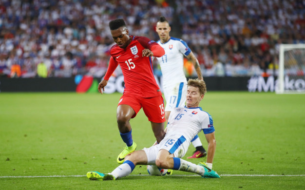 Daniel Sturridge is tackled Daniel Sturridge is tackled