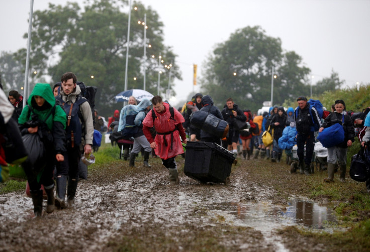 Muddy festival goers at Glastonbury 2016