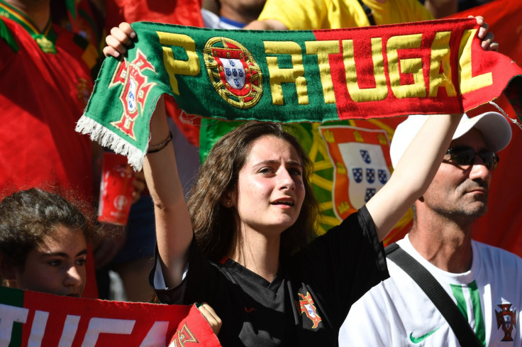 A Portugal fan sings the anthem