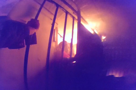 Chile: Dramatic footage shows police rescuing woman from deadly house fire