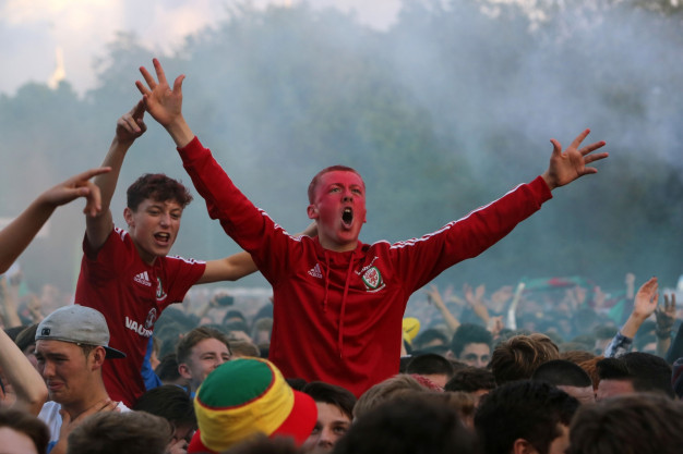 Welsh fans cheer their team Welsh fans cheer their team